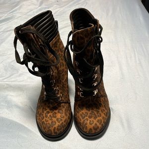 Leopard print heeled boots. Never worn outside.